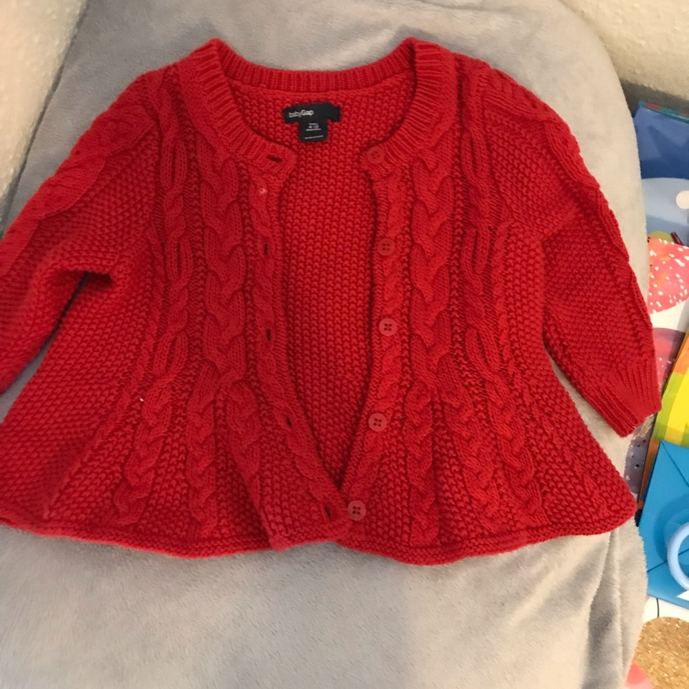 Red sweater. Perfect condition. Super cute !